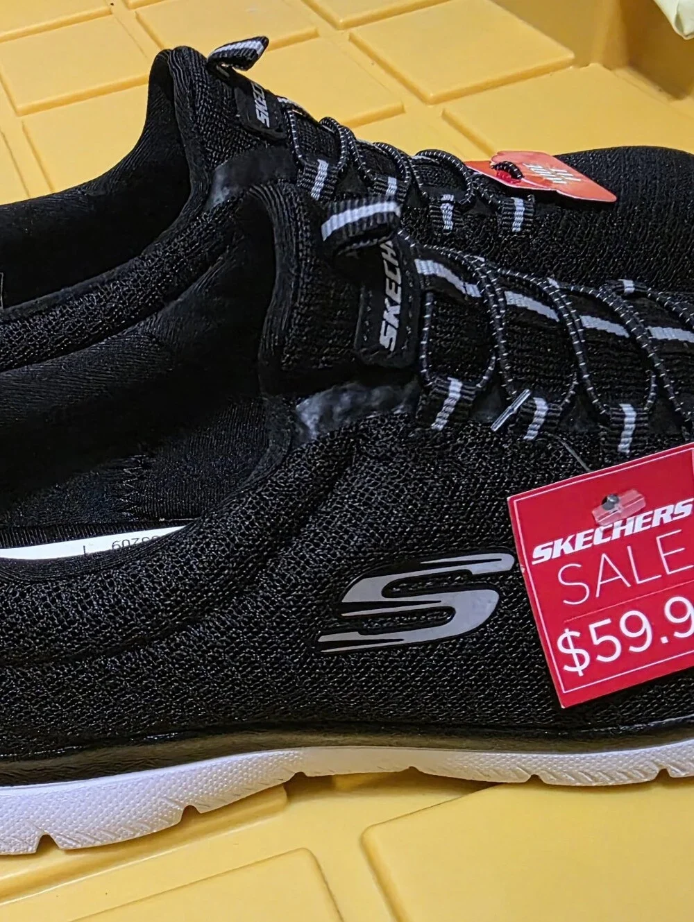 Skechers Black Slip-On Athletic Sneakers with White Soles